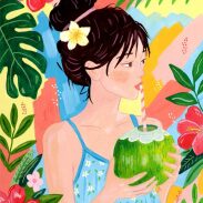 Femme tropicale tenant une noix de coco
