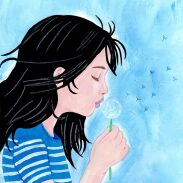 Fille soufflant sur un pissenlit