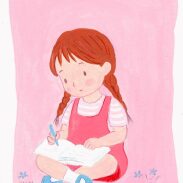 Fille écrivant dans un cahier