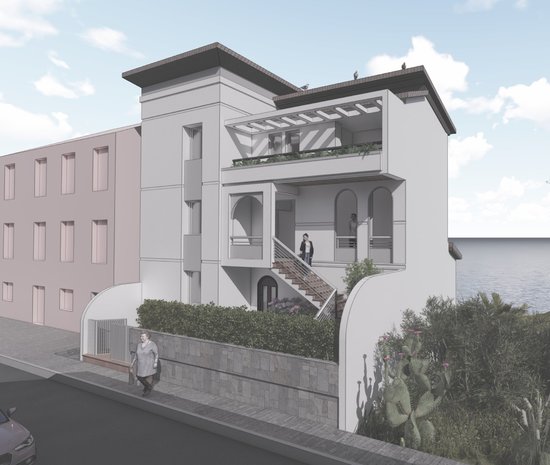 VIEW OF THE REAR ELEVATION WITH THE SECONDARY ENTRANCE
