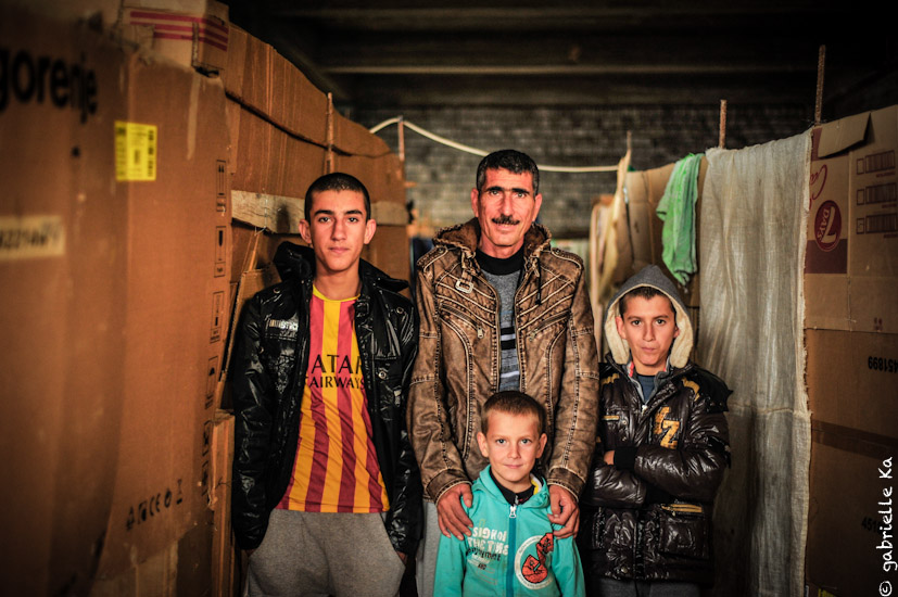 © Gabrielle Ka<br/><span>December, 2014. Suleiman is living in an unfinished Mosque. Each family has created her own living space made of plastic sheet and cartons.</span>