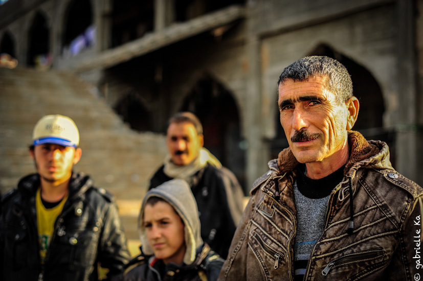 © Gabrielle Ka<br/><span>December, 2014. 
After months of siege, Abu Suleiman is going to the liberated town of Sinjar today. A first step to check the state of his house and the situation around.</span>
